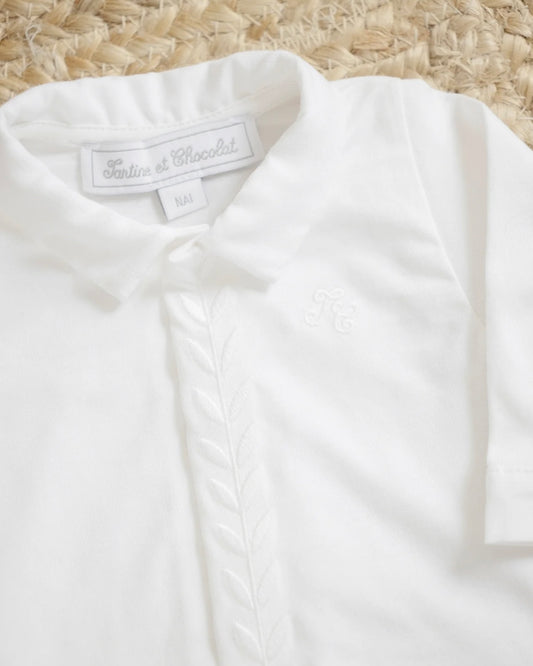 White cotton babygrow