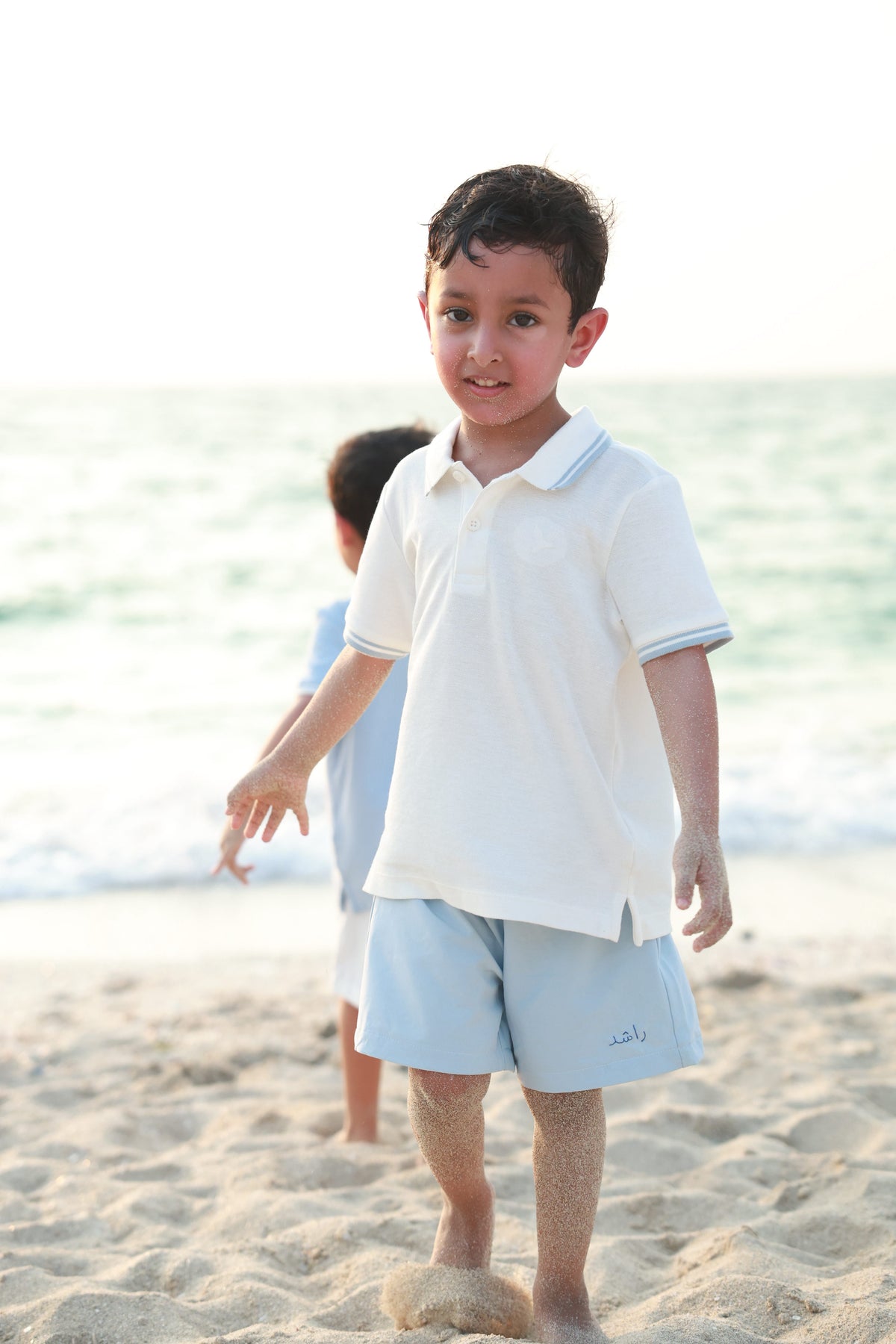 Cream Polo T-shirt with blue trim