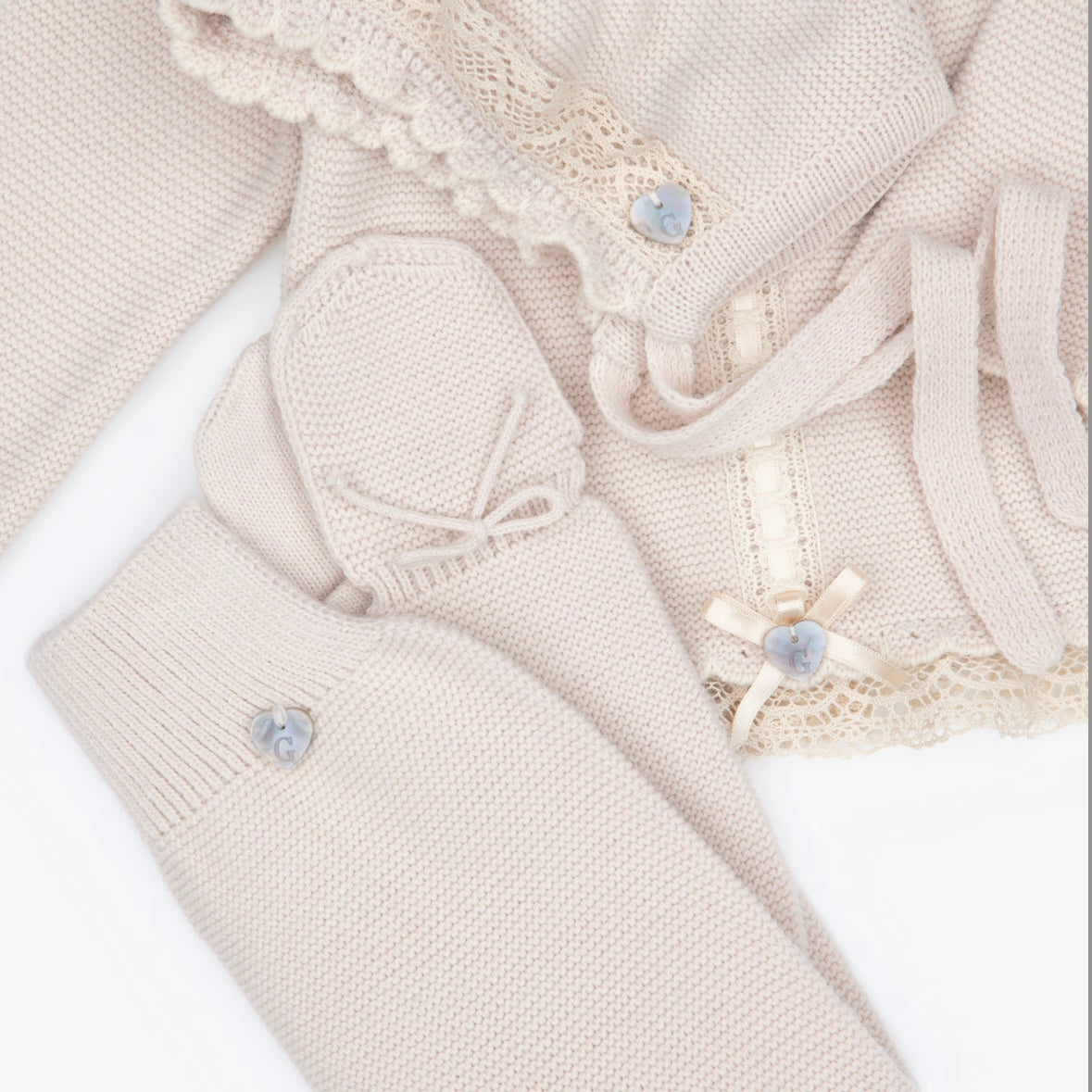 Light pink/beige babygrow set + bonnet